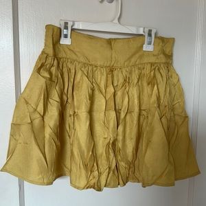Yellow metallic mini skirt. Size M.